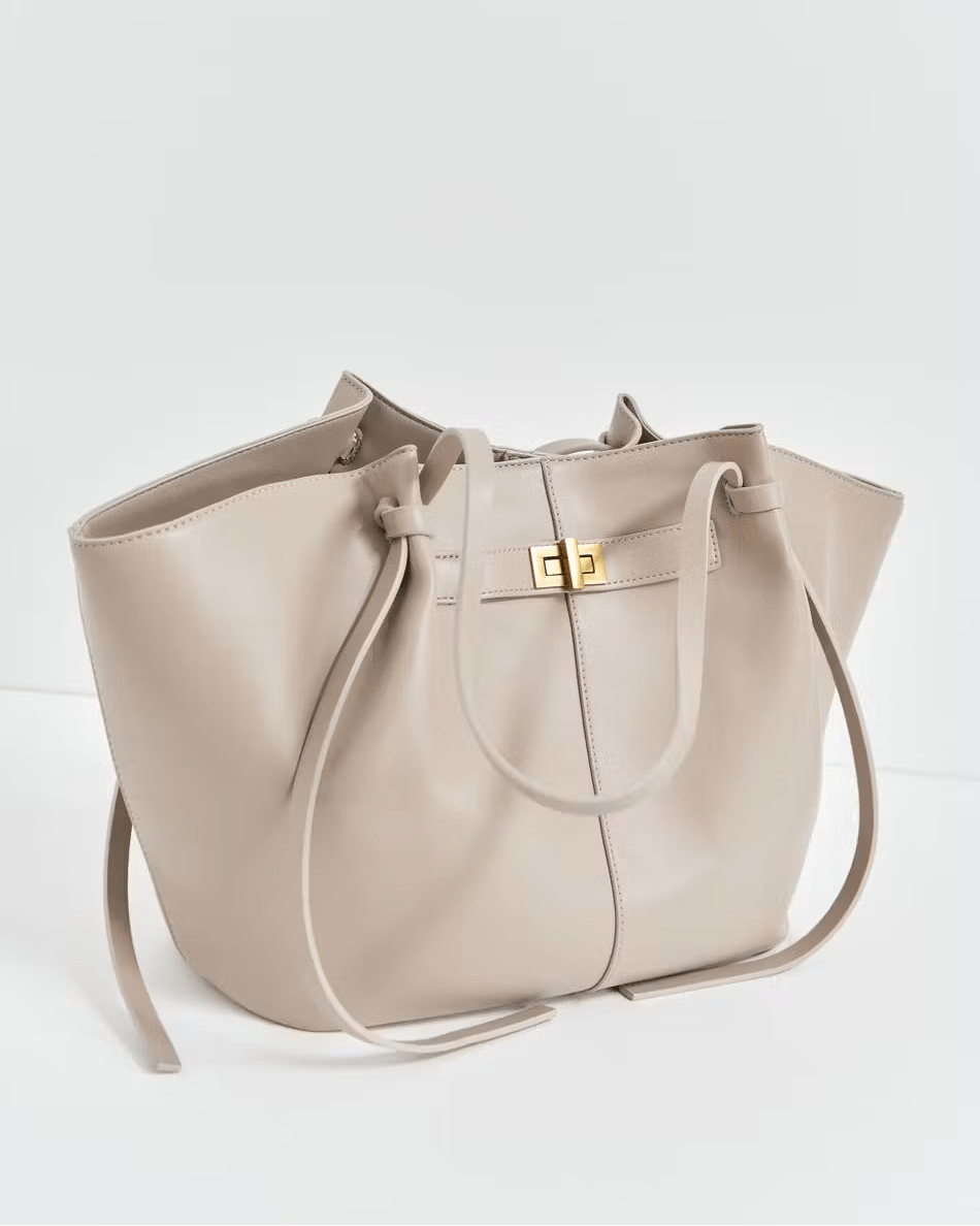 ARIA | Bolso Luxe Curve — El Complemento que lo Dice Todo